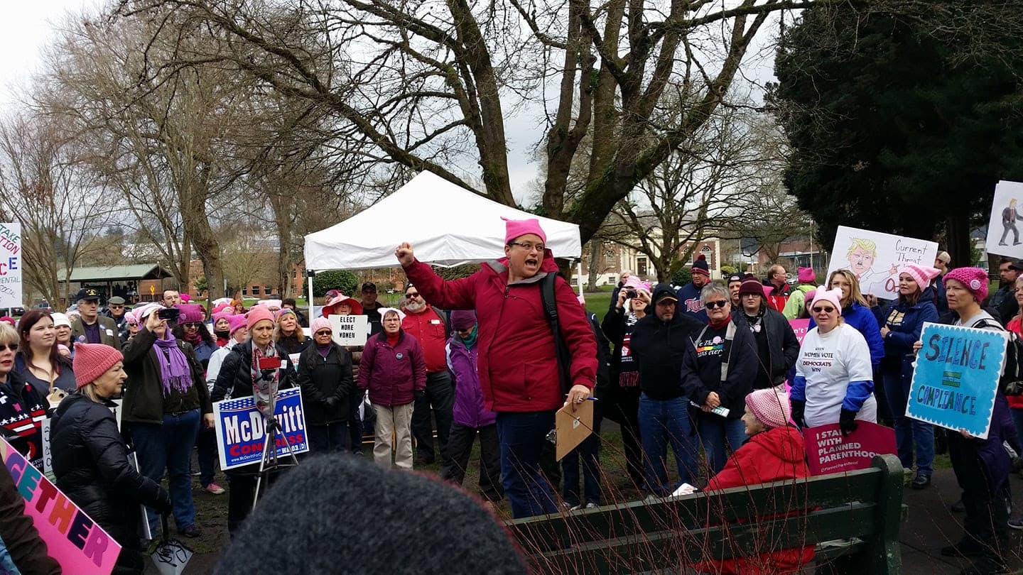 Teresa Purcell rallying a crowd at a community event